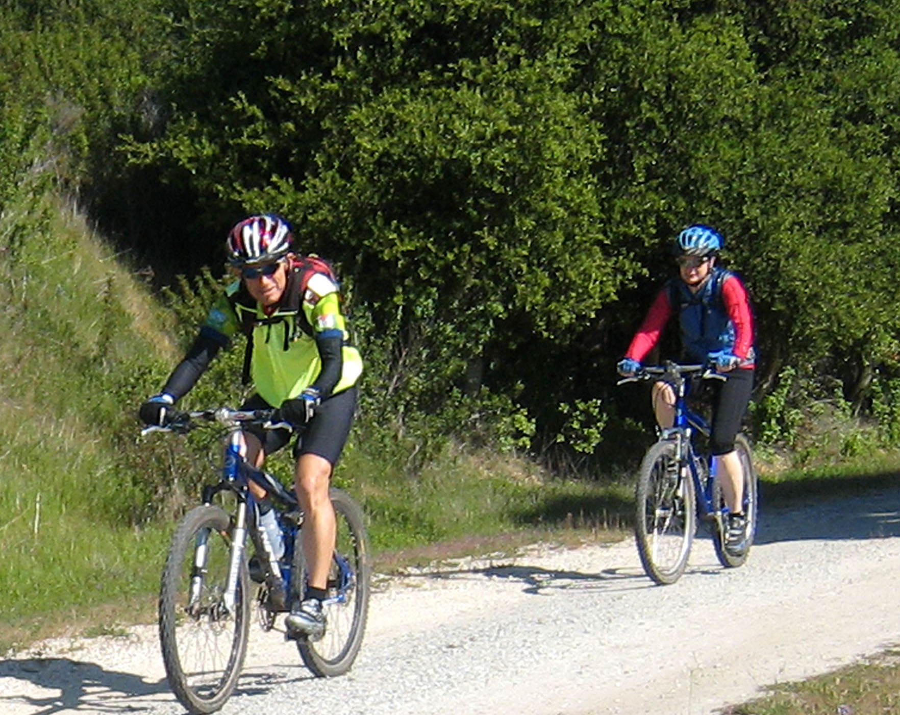 Franz and Ann mountain biking to Sea Otter Classic
